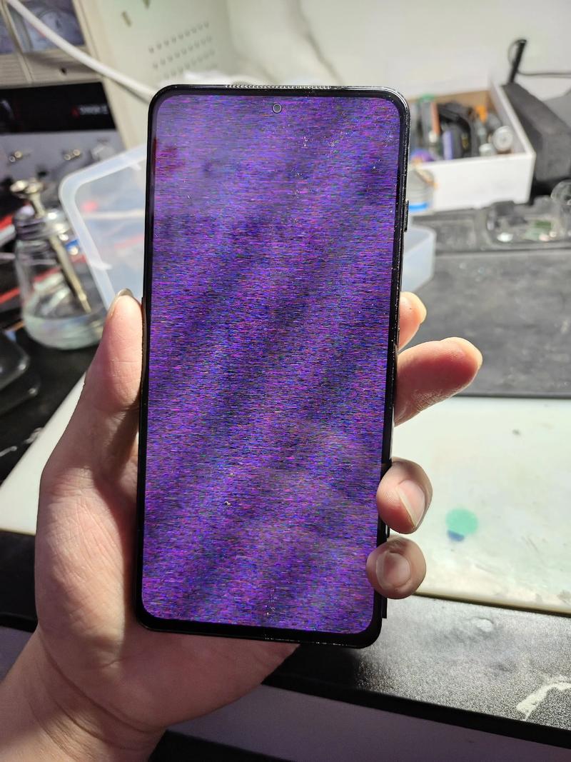 手机突然花屏了怎么回事